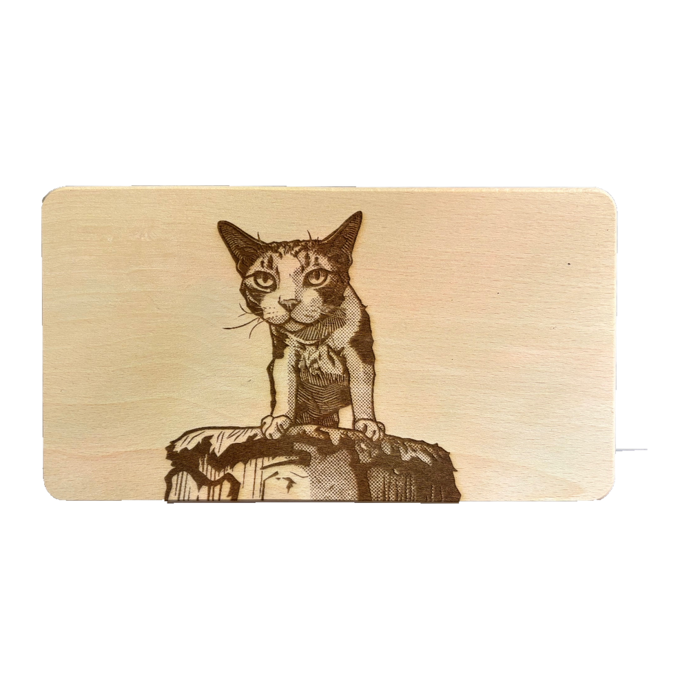 Katze aus der Nachbarschaft, graviert auf ein Holzbrett